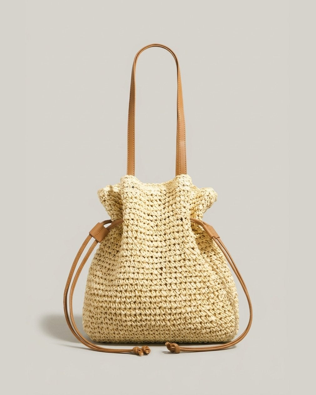 Wiltrud, Beuteltasche aus Strohgeflecht in Creme, von Hanna Hamburg